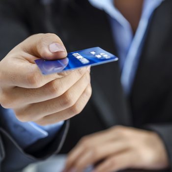 Somone handing over a credit card