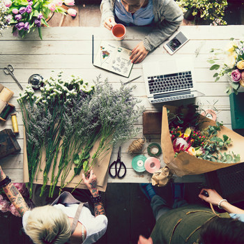 Flowers laid out on a floral shop worktable